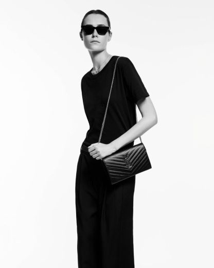 CASSANDRE SAINT LAURENT MATELASSÉ CHAIN WALLET IN GRAIN DE POUDRE EMBOSSED LEATHER