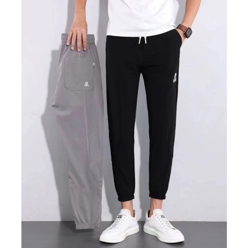 Men’s casual denim pants 2022 new harem pants Korean-style loose elastic waist ankle-tied trendy all matching trousers