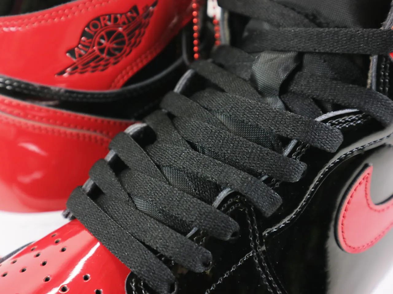 AIR JORDAN 1 RETRO HIGH OG "BLACK/VARSITY RED-WHITE"