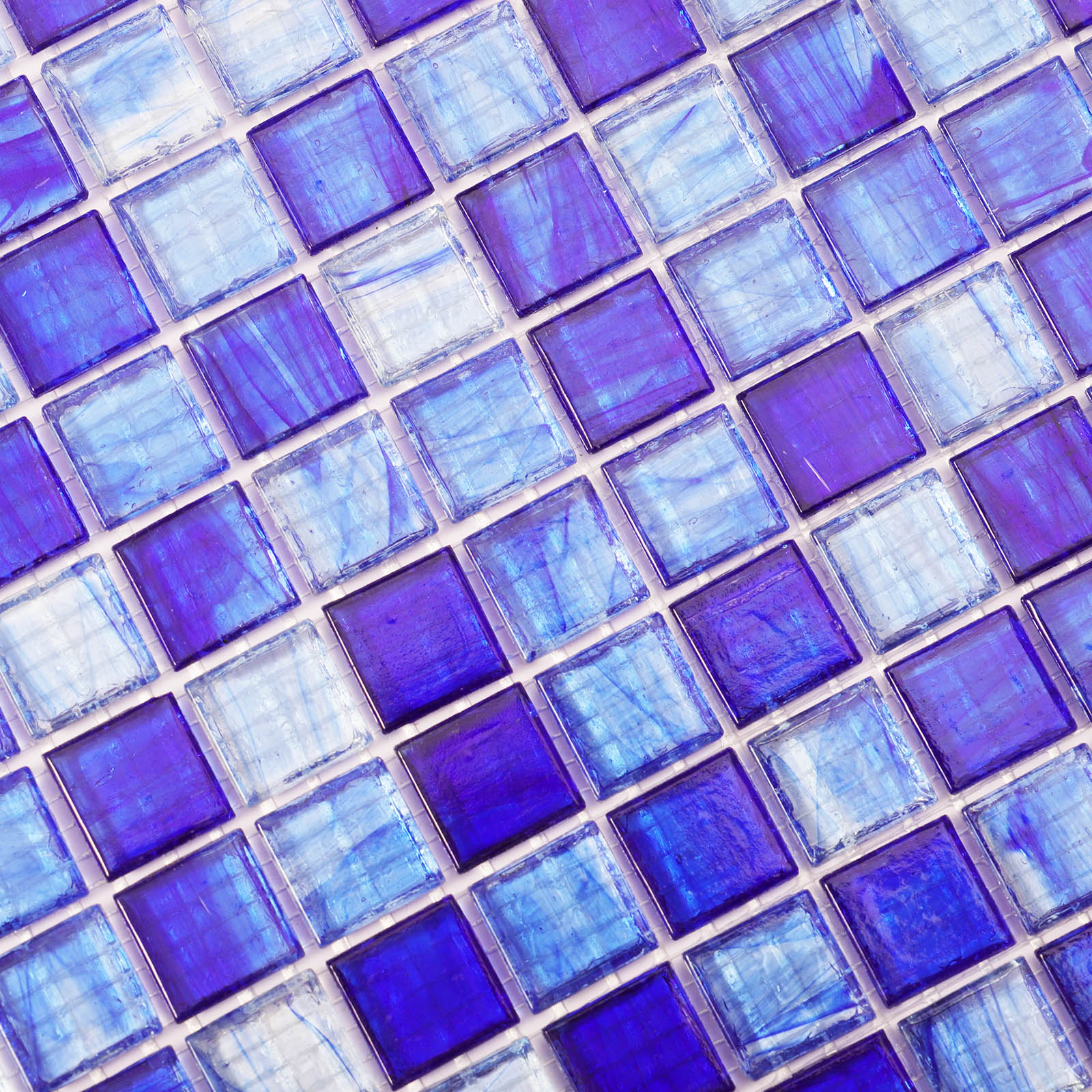 Detailed close-up of blue glass mosaic tiles.