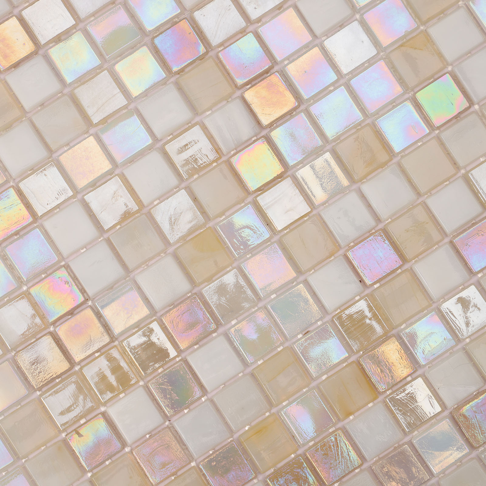 Close-up view of beige iridescent mosaic tiles.