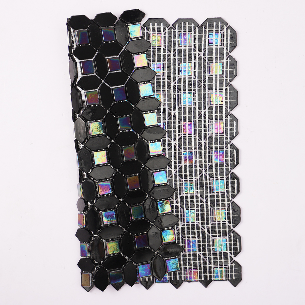 Back side of black mini picket and square iridescent glass mosaic tiles, folded.