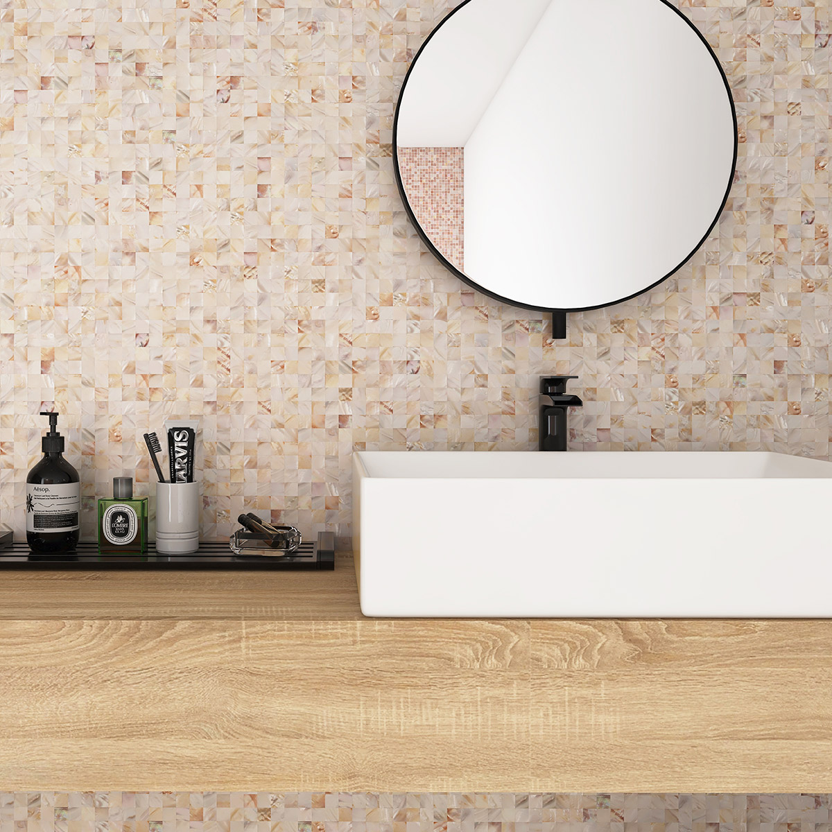 Natural mother of pearl mosaic tile on bathroom wall.