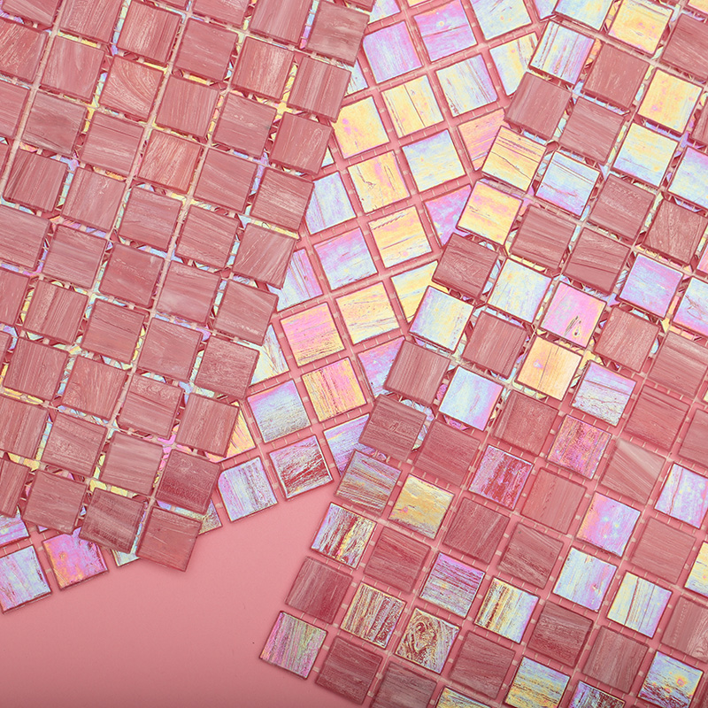 A few sheets of pink iridescent glass mosaic tiles.
