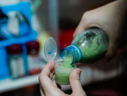 pouring sour, sweet, spicy and bitter mixture for wedding game