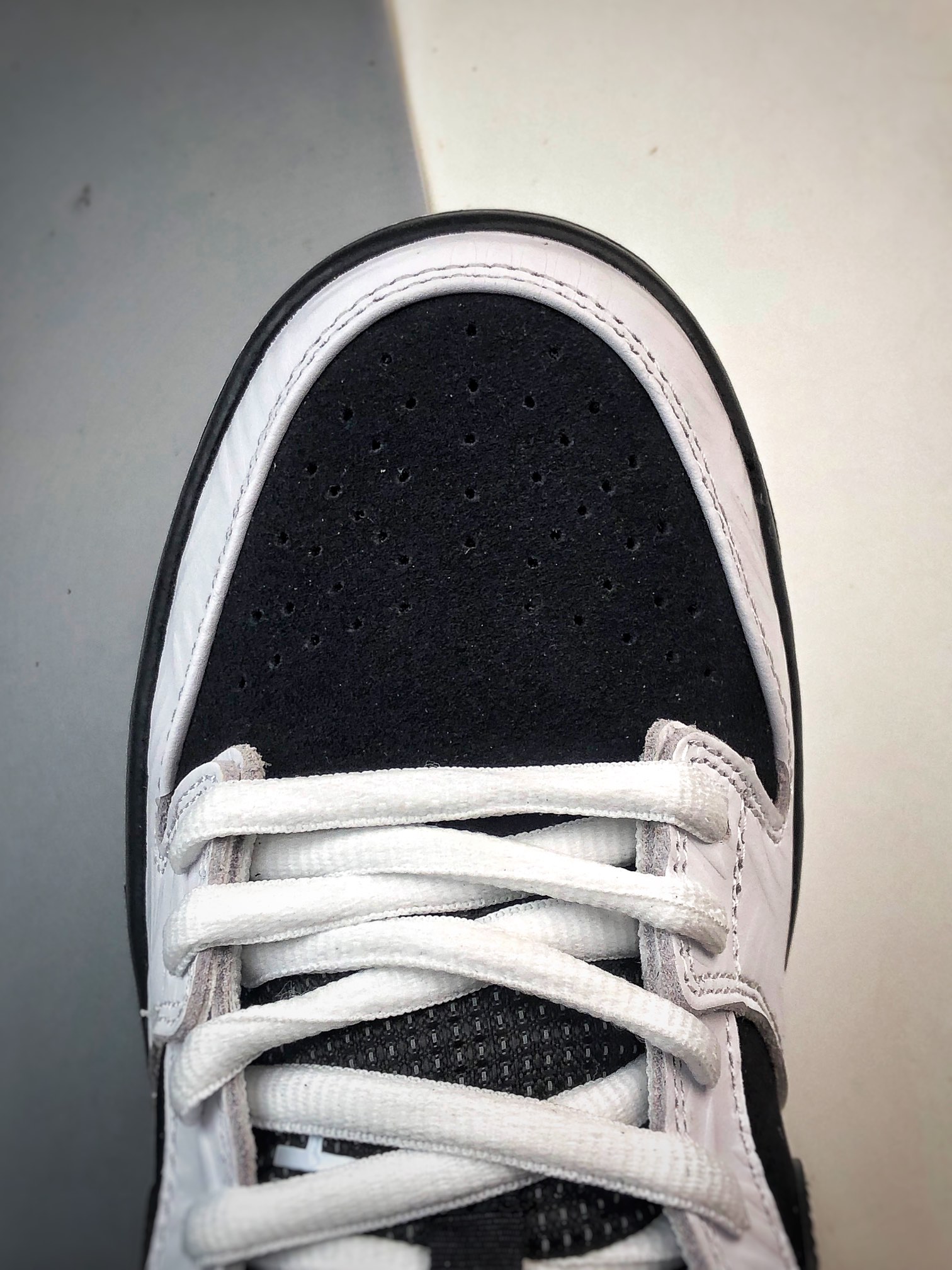 TIGHTBOOTH × Nike SB Dunk Low "White/Black"（FD2629-100）