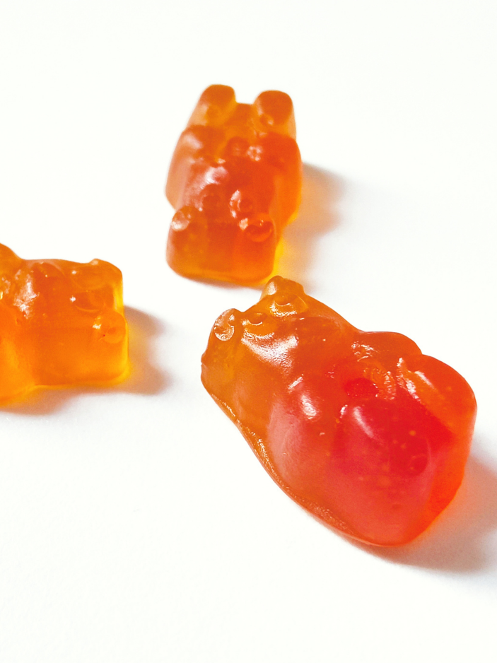 3 orange colored, berry gummies for hangover protection and liver support 
