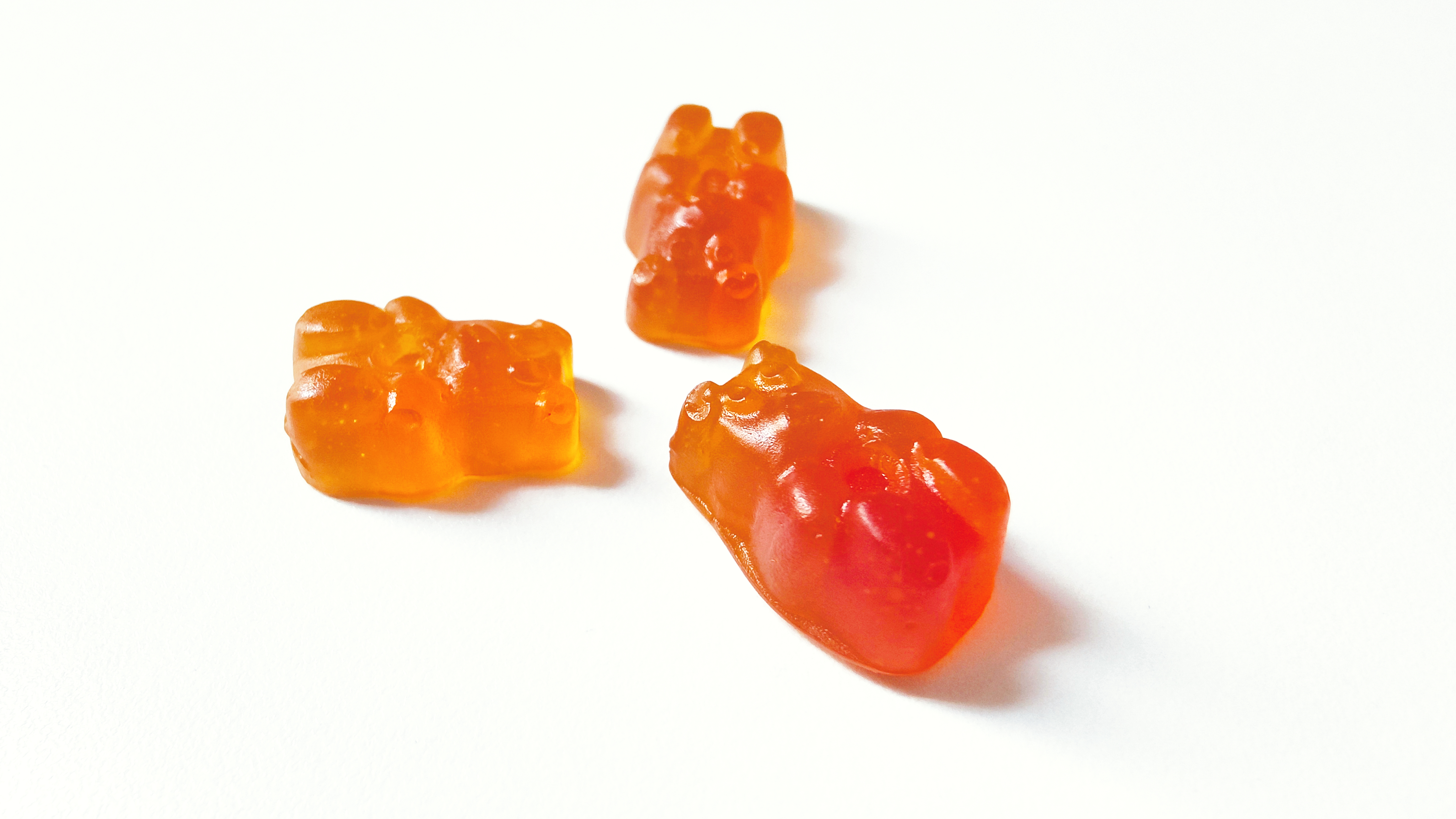 3 orange colored, berry gummies for hangover protection and liver support 
